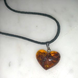 Amber gem heart on cord necklace